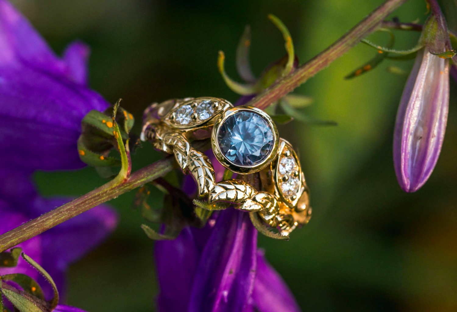 bespoke alexandrite ring with diamonds in yellow gold